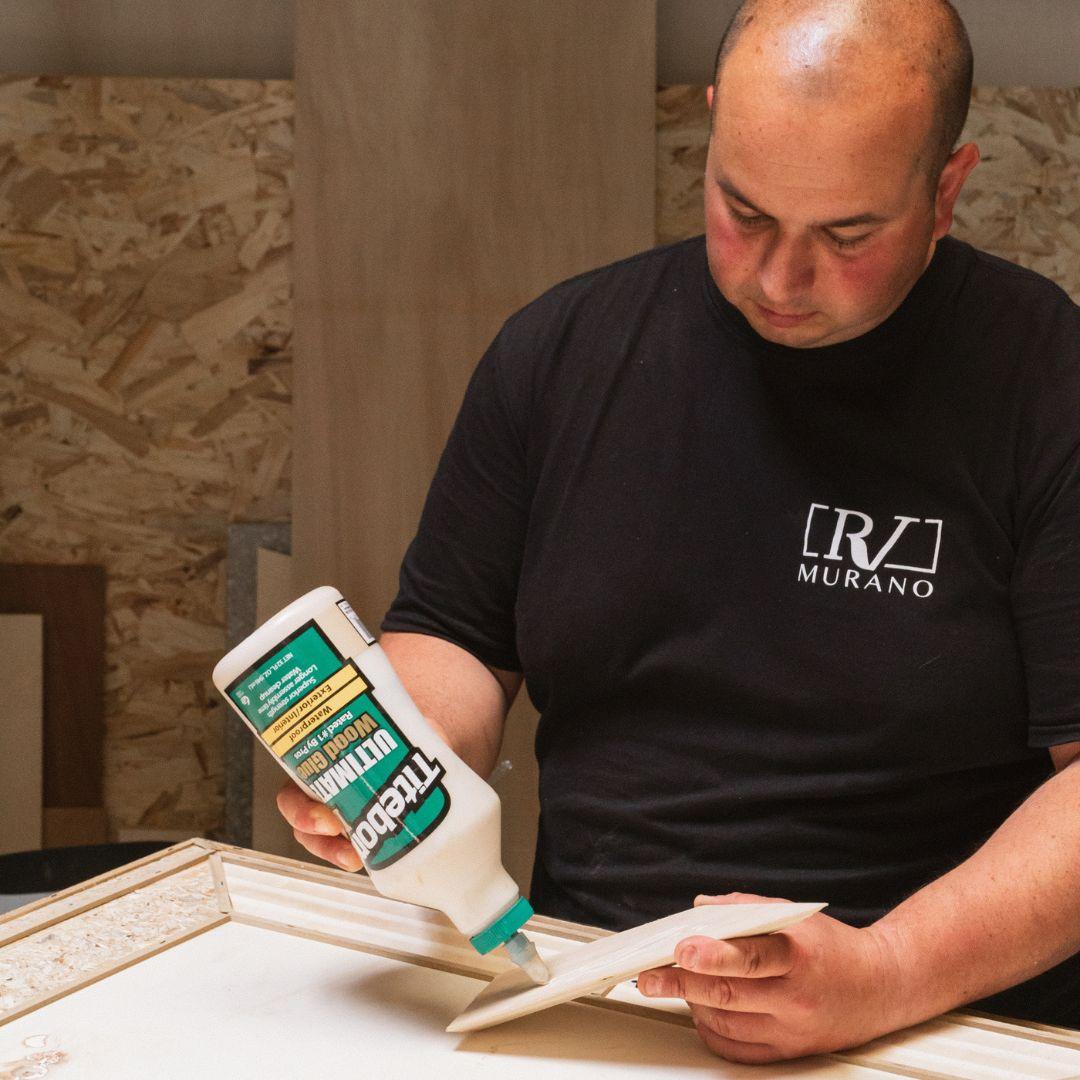 Titebond being applied to a piece of wood