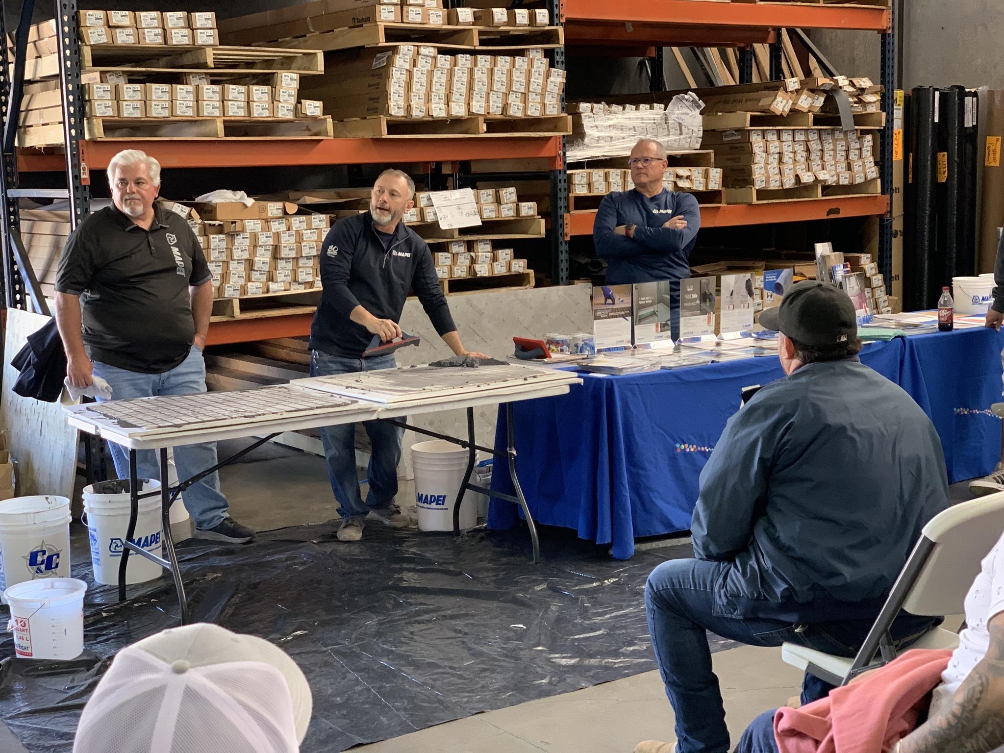 People showing off products to a crowd