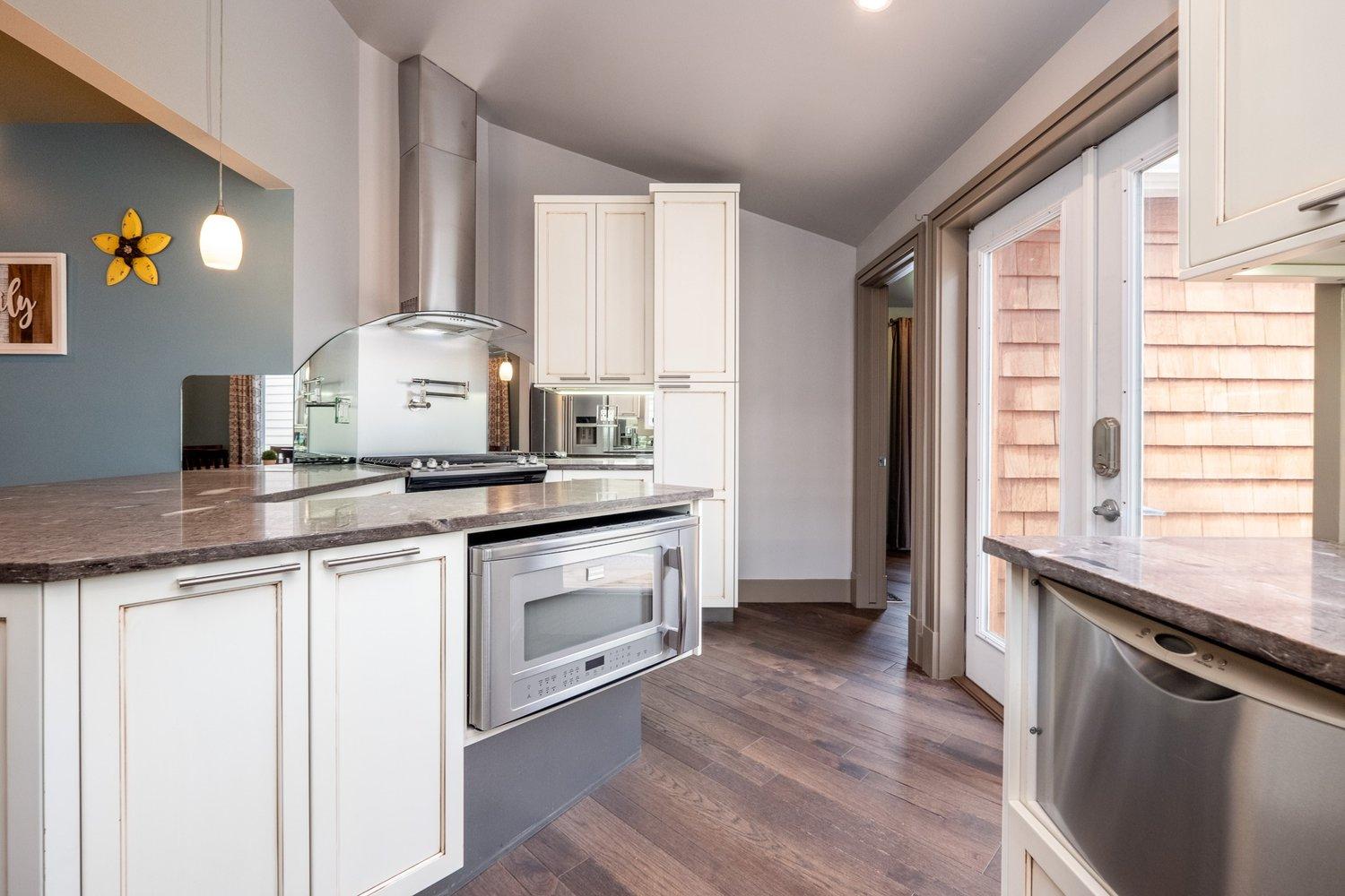 Kitchen with wood flooring