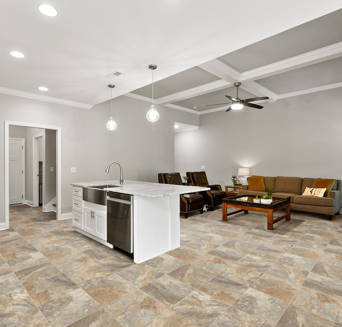 Square flooring in an open concept kitchen and living room