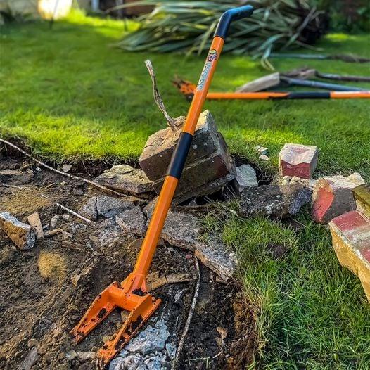 Round Handle Demolition Bar in dirt